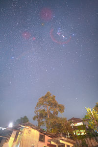Low angle view of road against sky at night