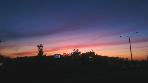 Silhouette of buildings at sunset