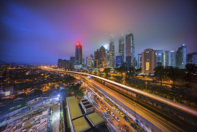 High angle view of illuminated city at night