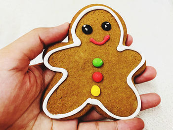 Close-up of hand holding cookies