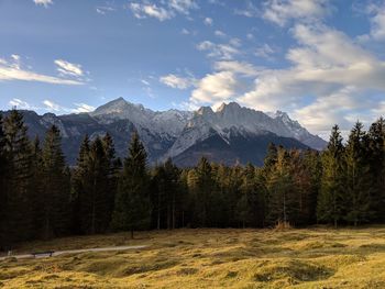 Scenic view of snowcapped mountains against sky