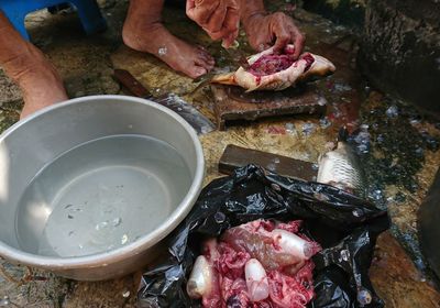 High angle view of meat in cooking pan