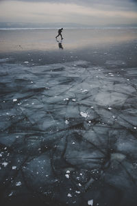 Scenic view of frozen sea during winter