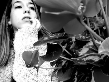 Close-up portrait of young woman with ice cream