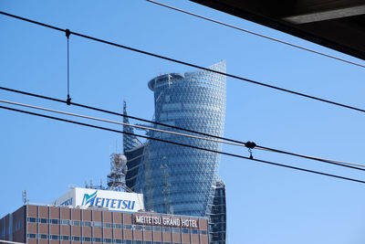 Low angle view of buildings against clear sky