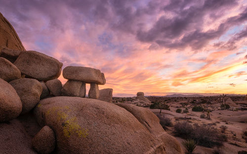 Rock formations on landscape against sky during sunset at joshua tree national park