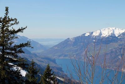 View of mountain range against blue sky