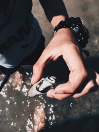 Low section of woman with hands