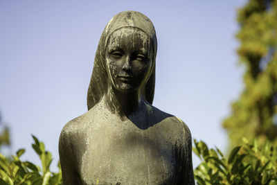 Low angle view of statue against sky