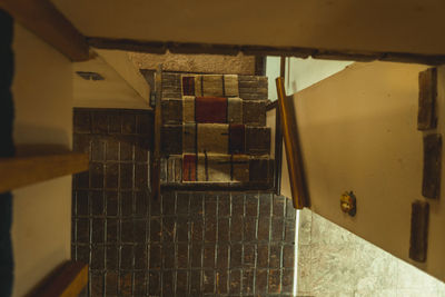 Close-up of old staircase in building