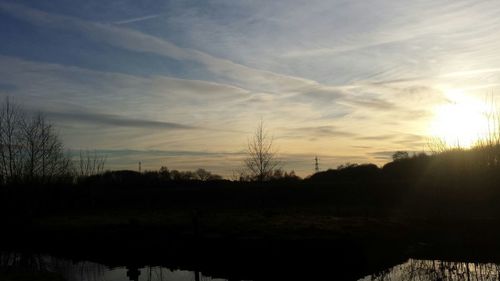 Scenic view of landscape at sunset