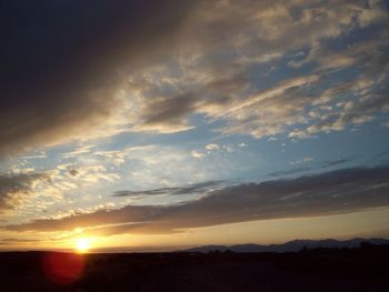 Scenic view of silhouette landscape against sky during sunset