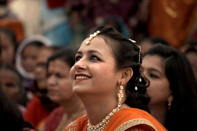 Smiling woman in traditional clothing