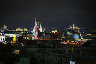 Illuminated cityscape at night