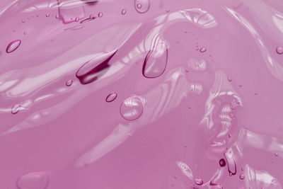 Full frame shot of wet pink paint