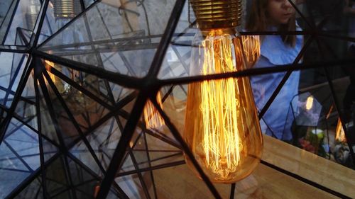 Close-up of illuminated lighting equipment