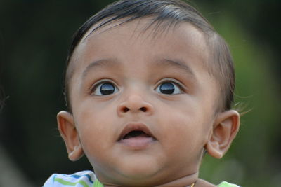 Close-up of cute boy outdoors