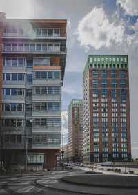 Buildings in city against sky