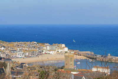 View of sea against blue sky