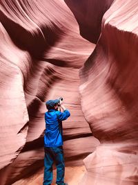 Full length of man standing on rock