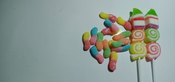 High angle view of multi colored candies on table