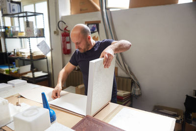 Man working on table