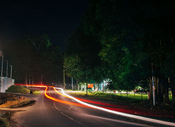 Light trails on road at night