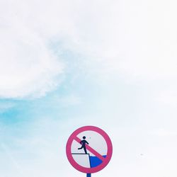 Low angle view of road sign against cloudy sky