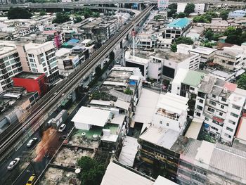 High angle view of street amidst buildings in city