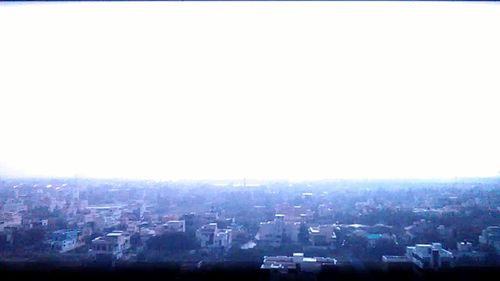 High angle view of cityscape against clear sky