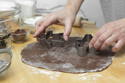 Midsection of man preparing food