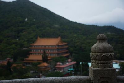 Close-up of temple against mountain