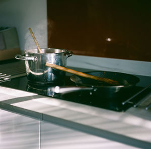 Close-up of kitchen utensils on table at home