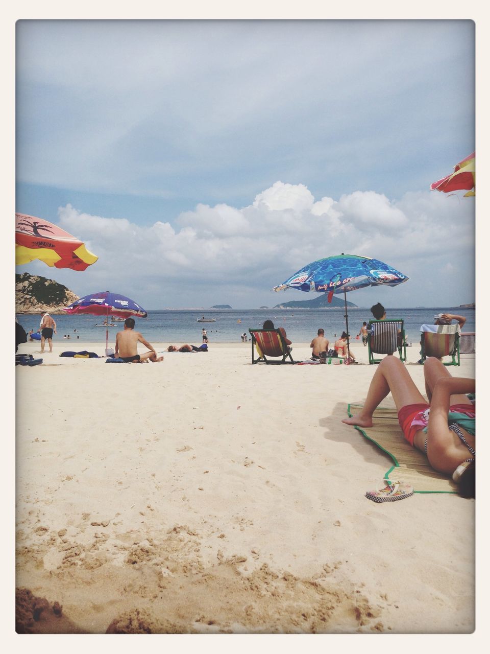 sea, beach, horizon over water, sand, water, sky, shore, vacations, leisure activity, scenics, lifestyles, beach umbrella, transfer print, tranquil scene, tranquility, relaxation, beauty in nature, person, nature