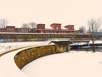 View of built structures against clear sky