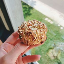 Close-up of hand holding ice cream