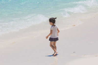 Full length of boy on beach