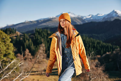 Young woman standing on mountain