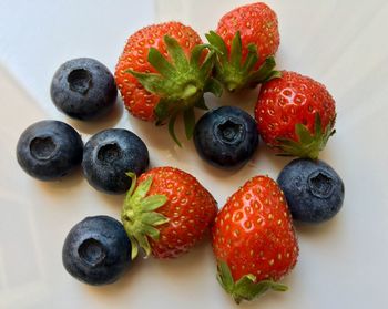 High angle view of fruits in plate on table