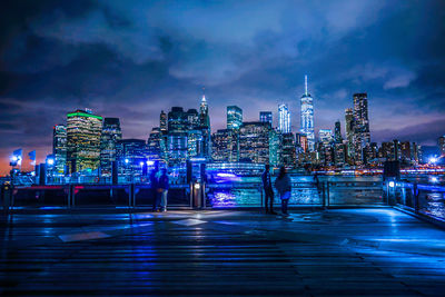 Illuminated buildings in city at night