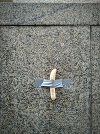 High angle view of umbrella on footpath