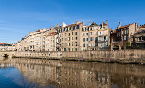 Reflection of buildings in river