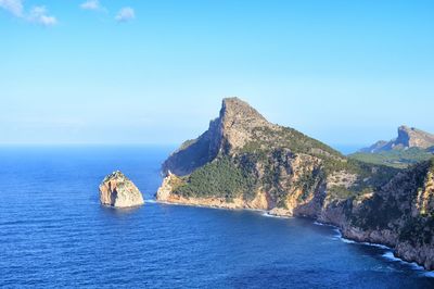 Scenic view of sea against blue sky