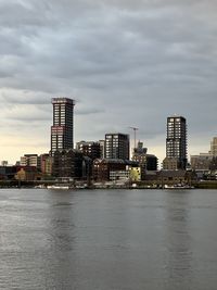 Buildings in city against sky