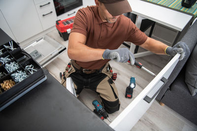 High angle view of man working at home