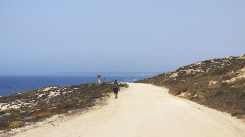 Scenic view of beach against clear sky