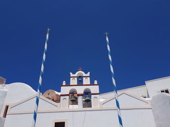 Low angle view of building against blue sky