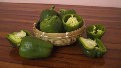High angle view of vegetables in basket on table