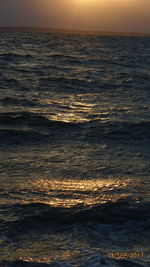 Scenic view of sea against sky at sunset
