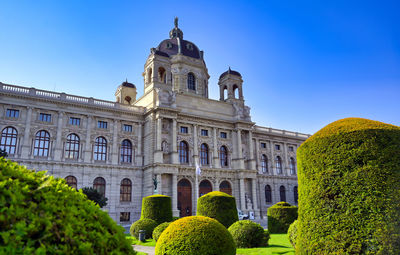 Low angle view of historical building against blue sky